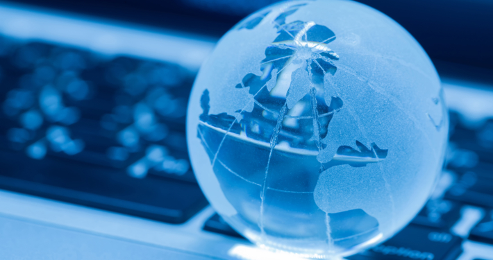 The business concept of the glass world on a laptop